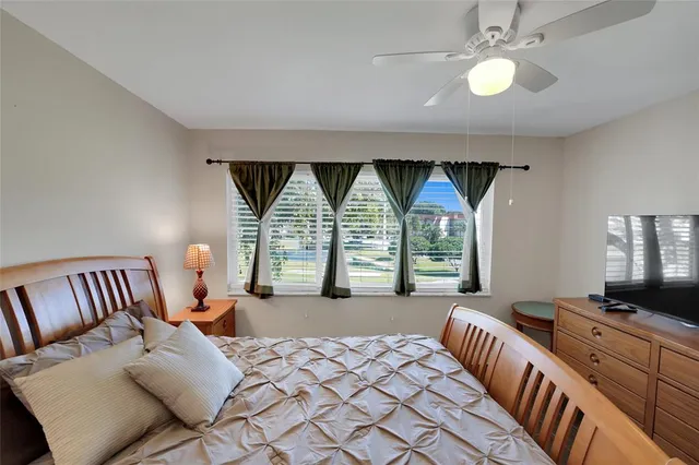 a view of a house with swimming pool yard and outdoor seating
