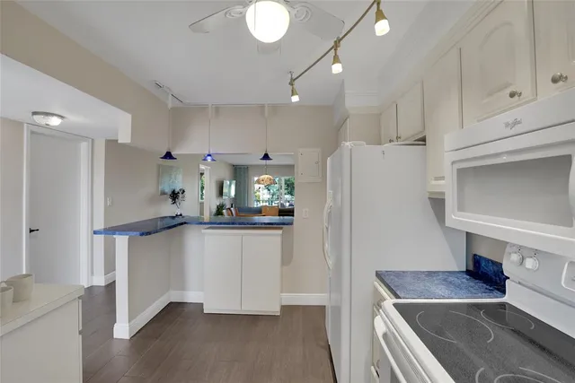 a view of swimming pool from a balcony