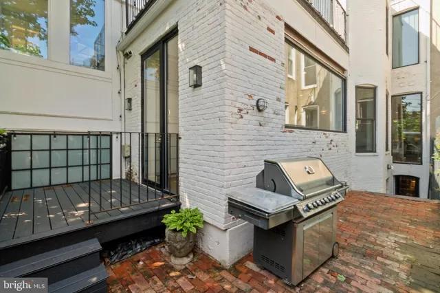 a front view of a house with outdoor space