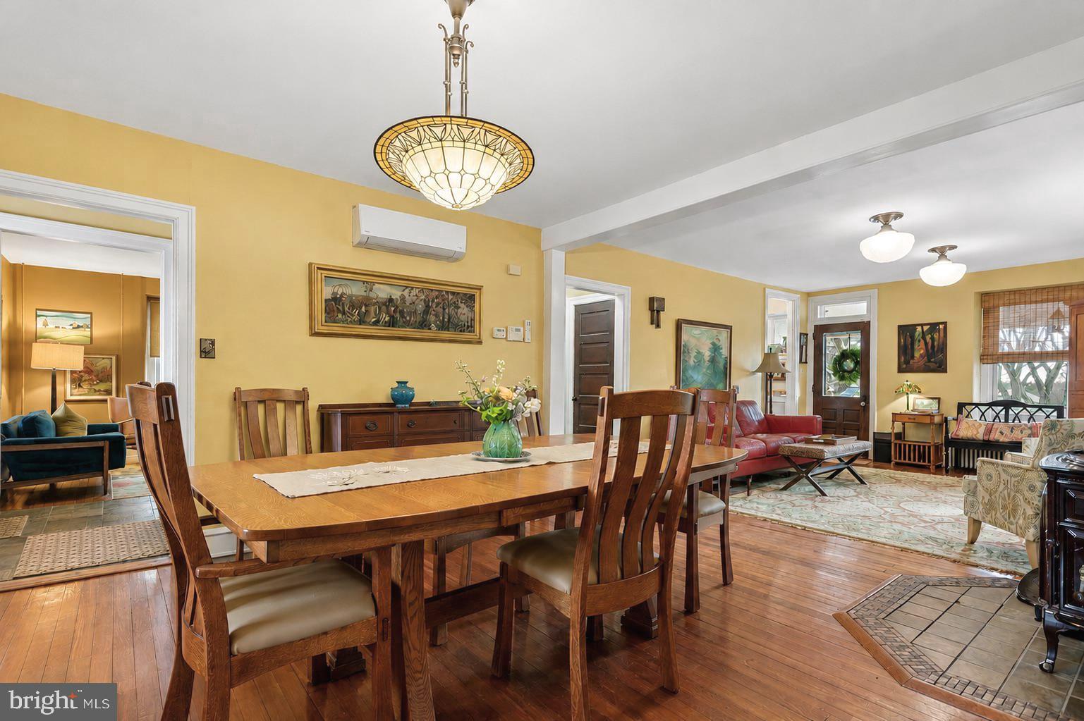 75 Morris Road Harleysville, PA 19438 - Photo 8 of 68 a view of a dining room with furniture wooden floor and chandelier