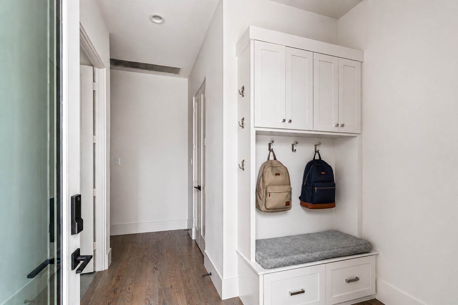 4638 Merwin Street Houston, TX 77027 - Photo 15 of 42 The functional mudroom creates an organized transition between the garage and main living spaces.