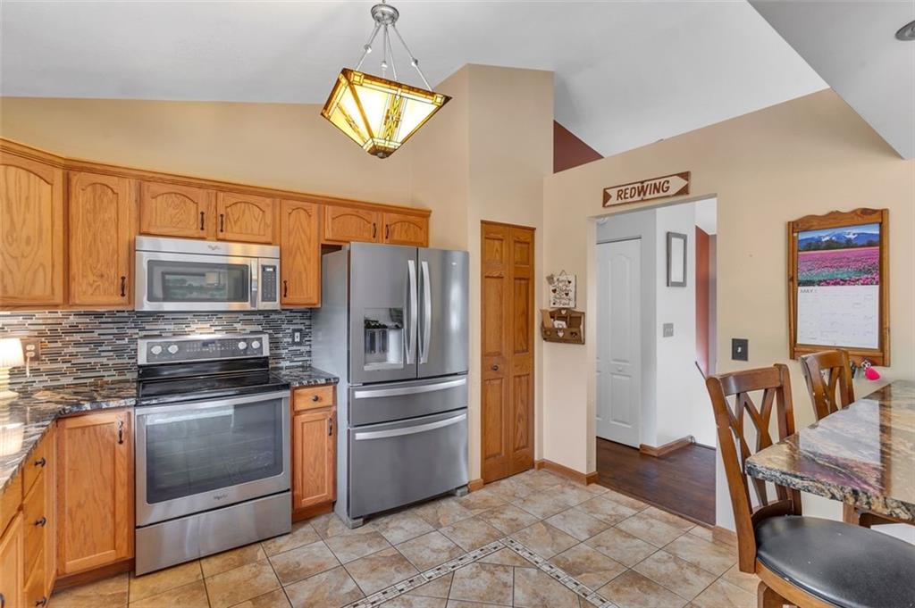 152 Cupps Road Renfrew, PA 16053 - Photo 21 of 43 a kitchen with stainless steel appliances a stove a refrigerator and a kitchen island
