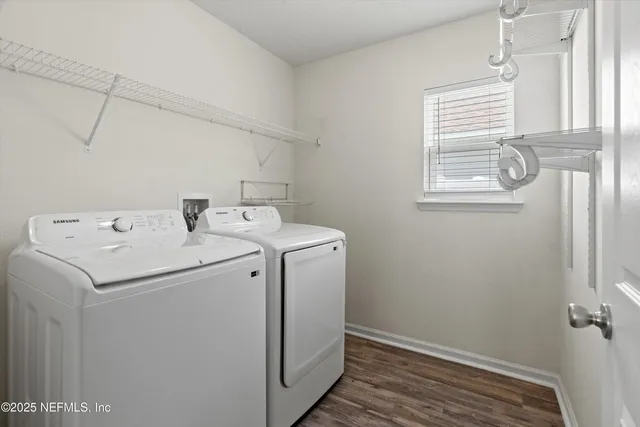 a utility room with dryer and washer
