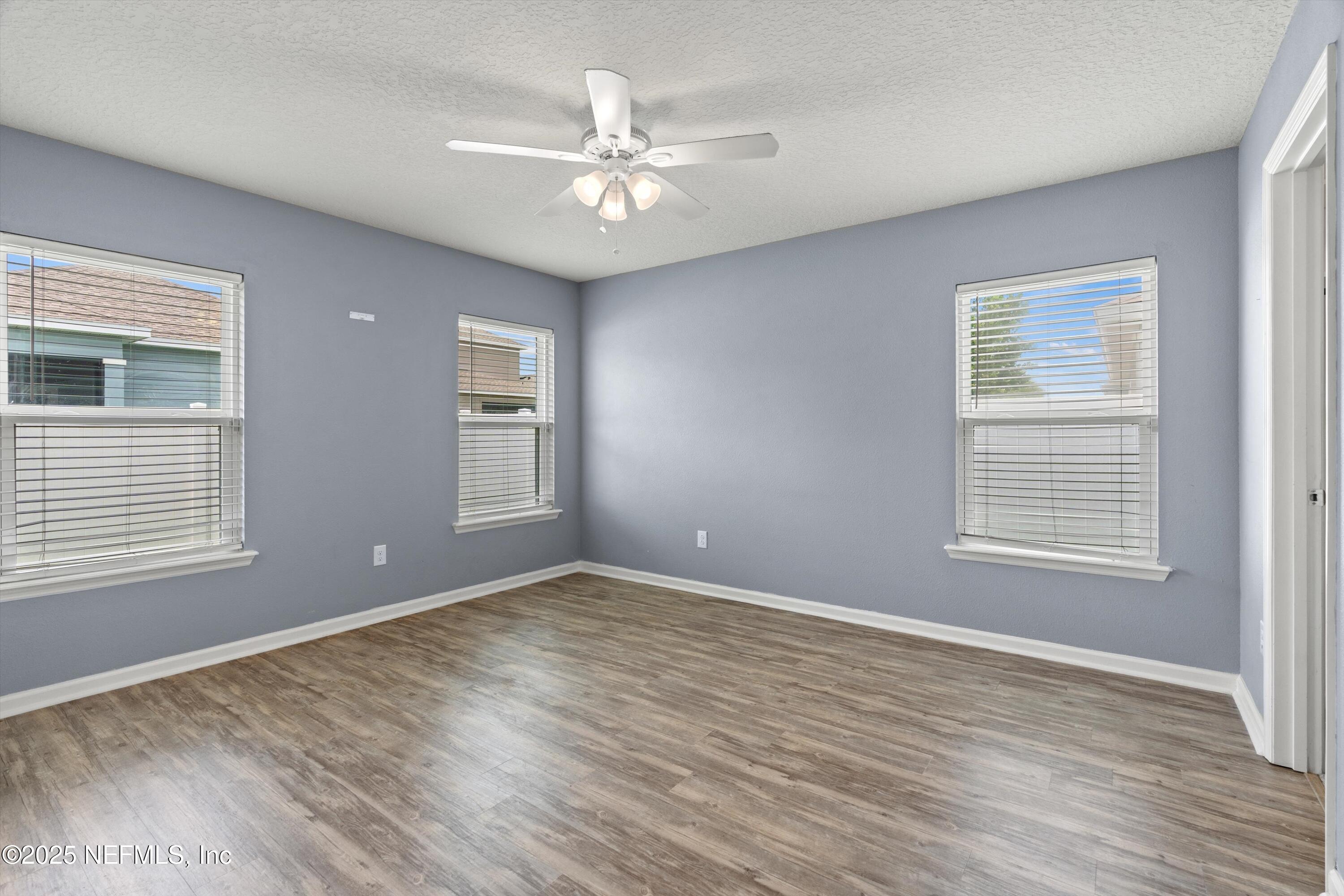 219 Bluejack Lane St. Augustine, FL 32095 - Photo 18 of 44 a view of an empty room with a window