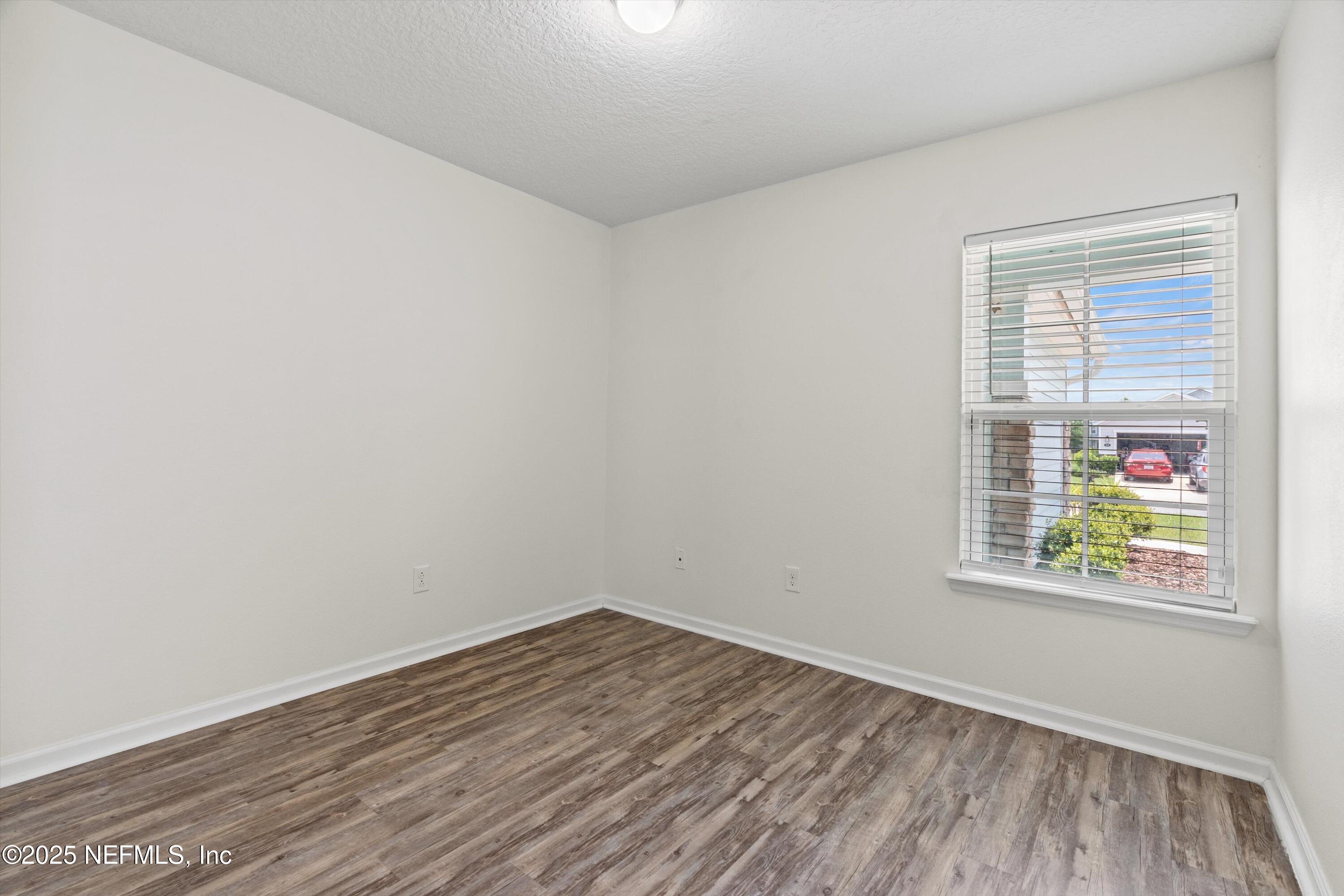 219 Bluejack Lane St. Augustine, FL 32095 - Photo 23 of 44 an empty room with a window