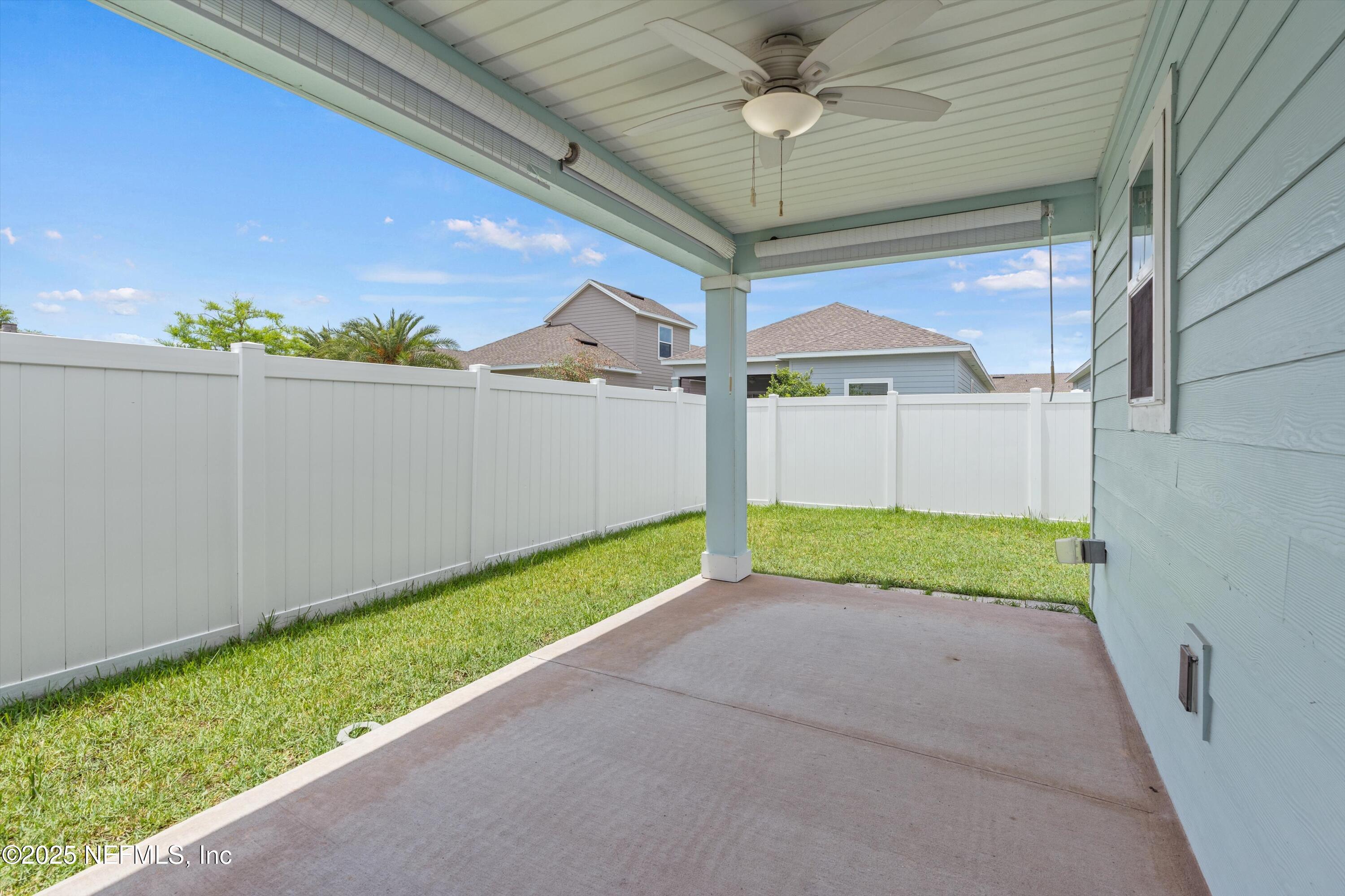 219 Bluejack Lane St. Augustine, FL 32095 - Photo 30 of 44 a view of a backyard with a garden