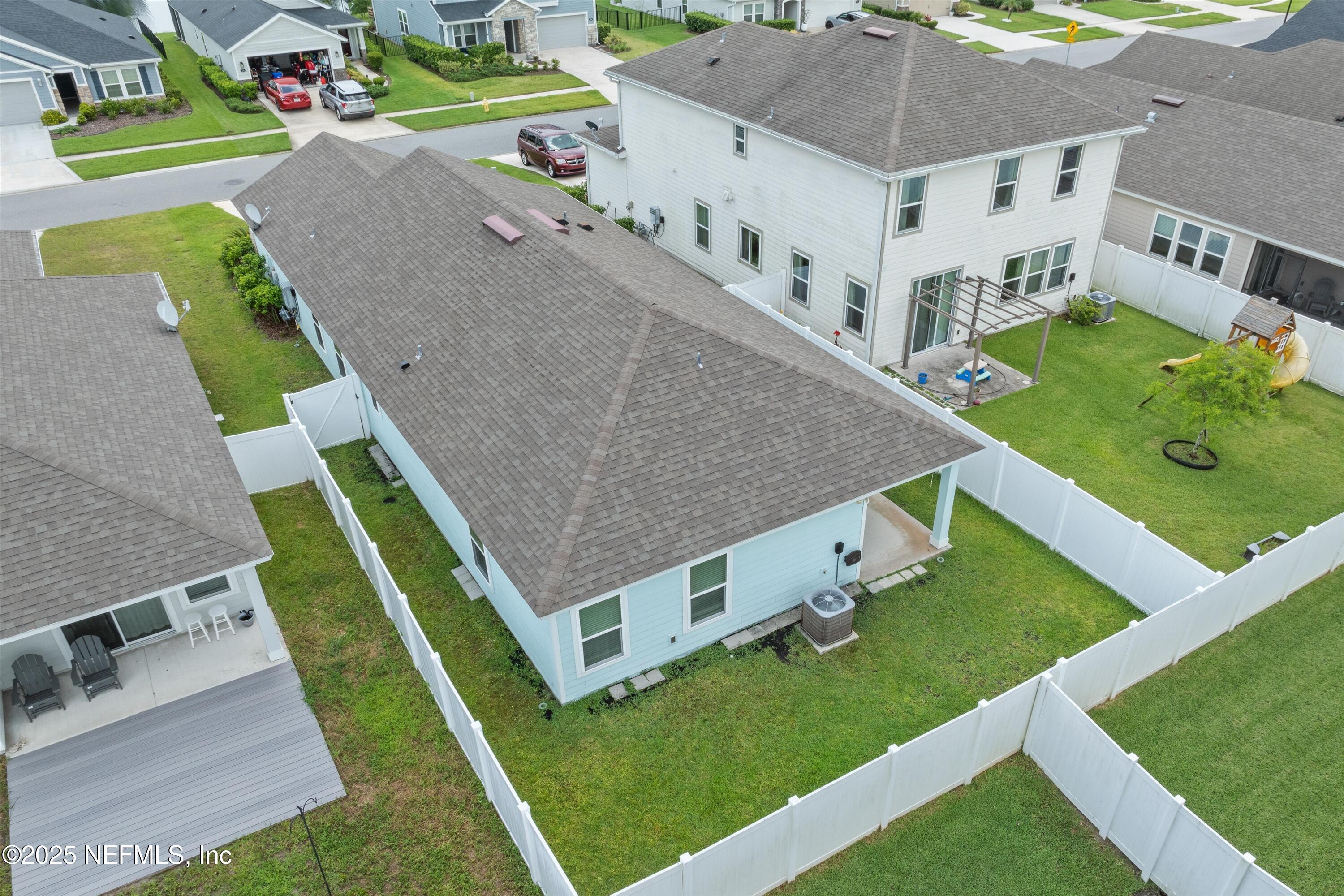 219 Bluejack Lane St. Augustine, FL 32095 - Photo 33 of 45 an aerial view of a house with a yard