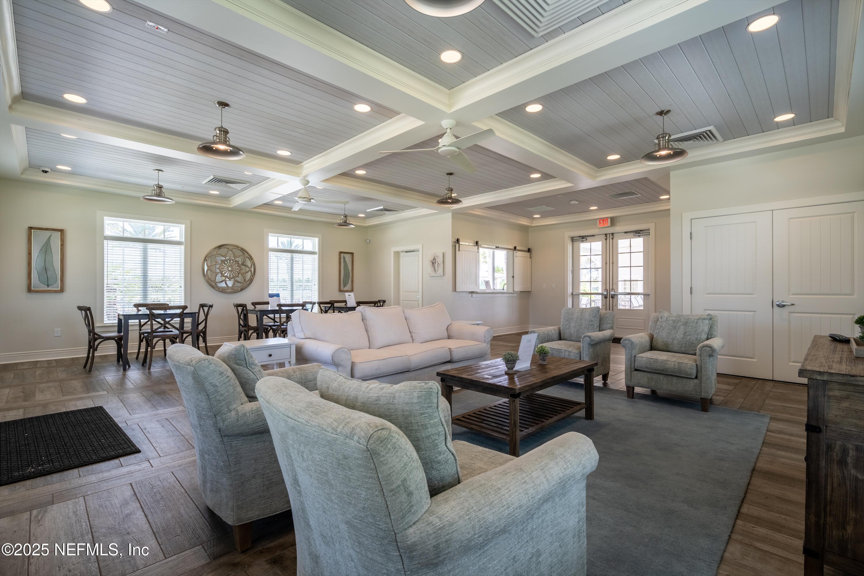 219 Bluejack Lane St. Augustine, FL 32095 - Photo 36 of 44 a living room with furniture and a large window