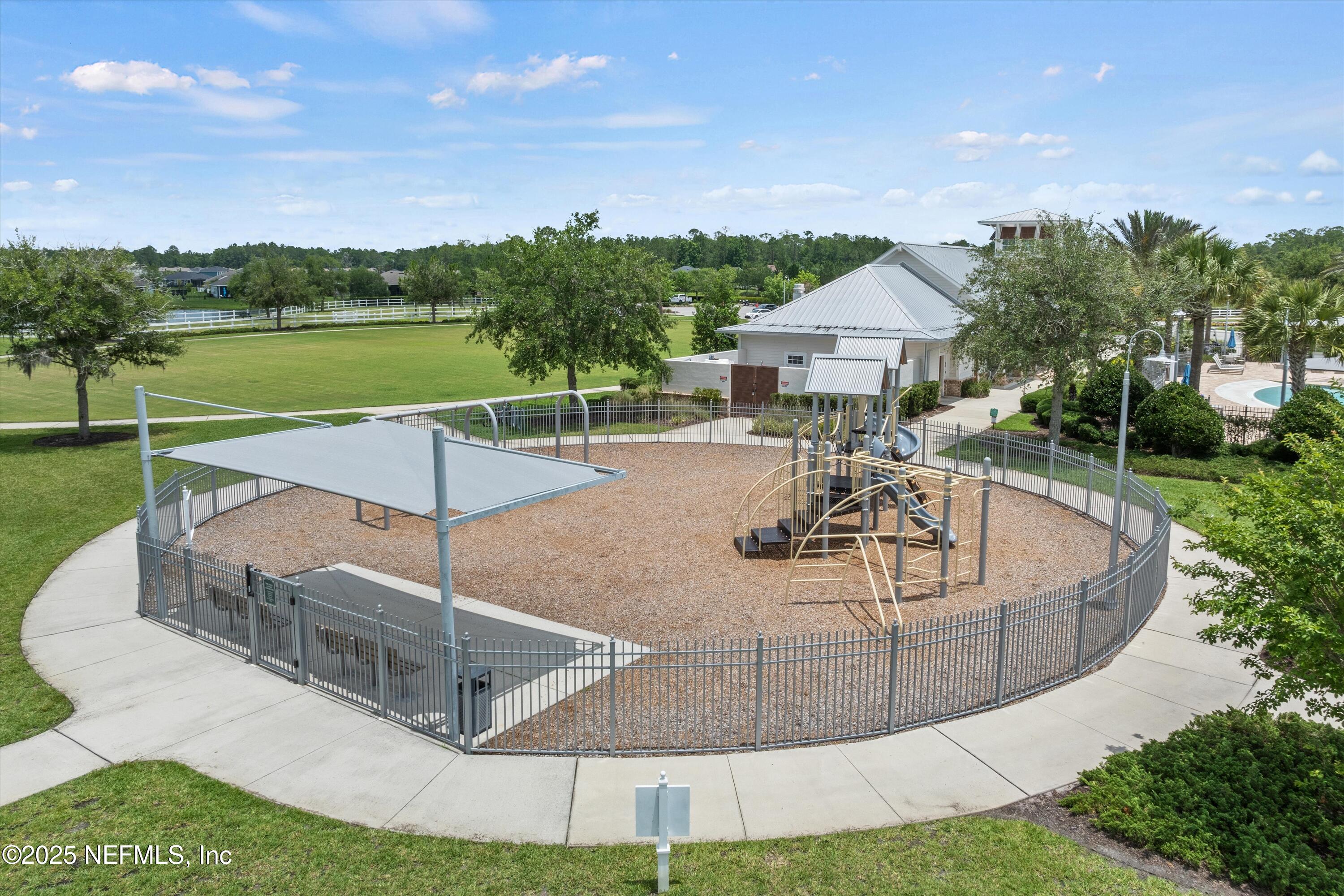 219 Bluejack Lane St. Augustine, FL 32095 - Photo 41 of 44 a view of a swimming pool with an outdoor seating