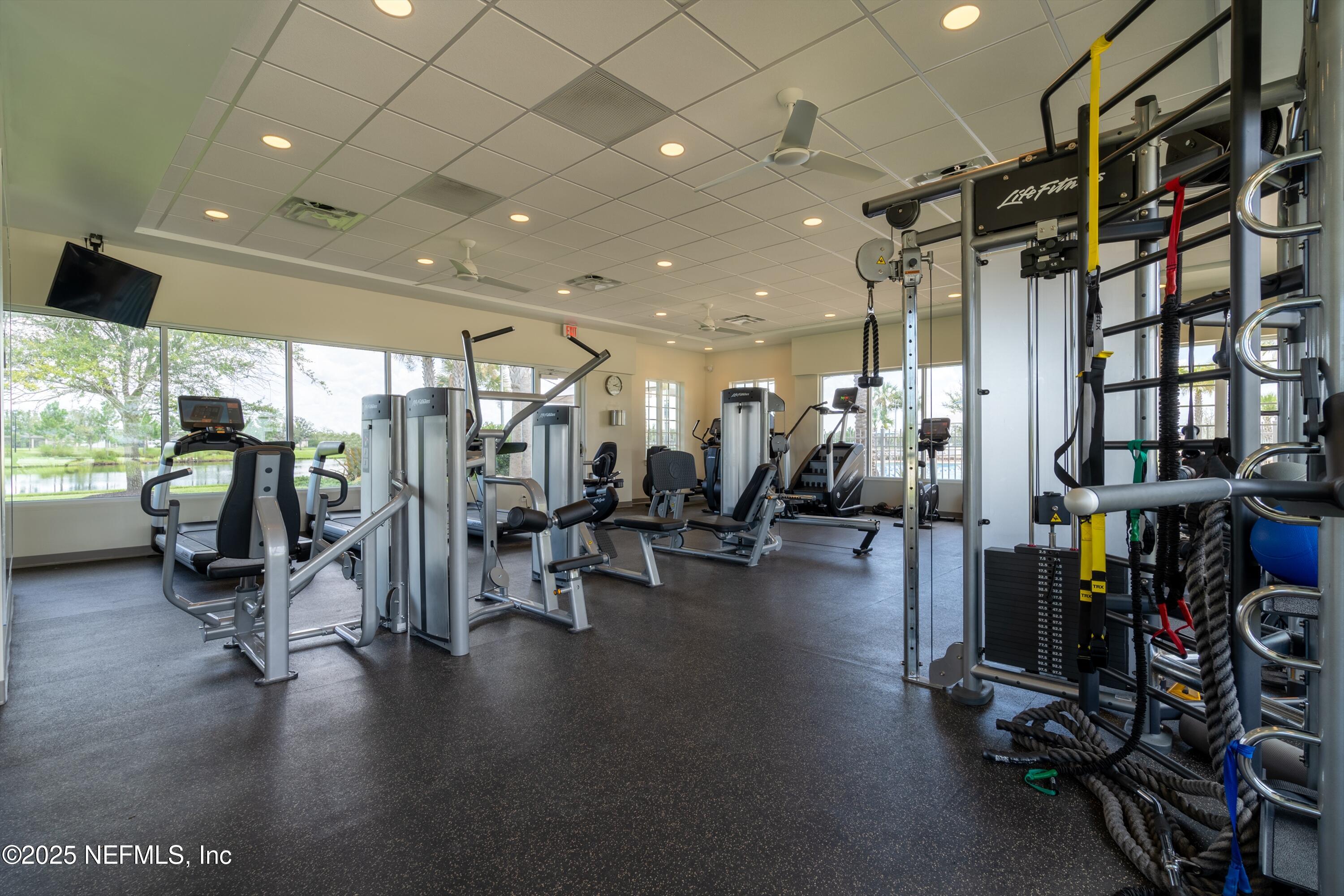 219 Bluejack Lane St. Augustine, FL 32095 - Photo 6 of 44 a view of a room with gym equipment