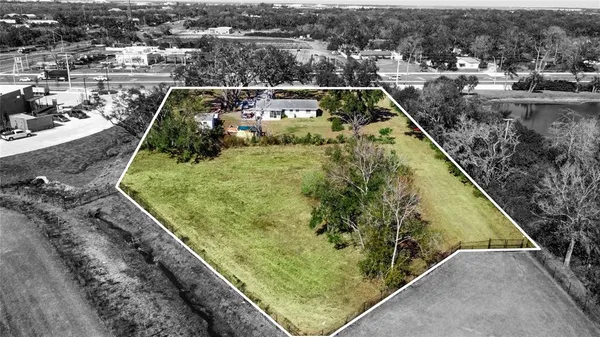 a view of a yard from a balcony
