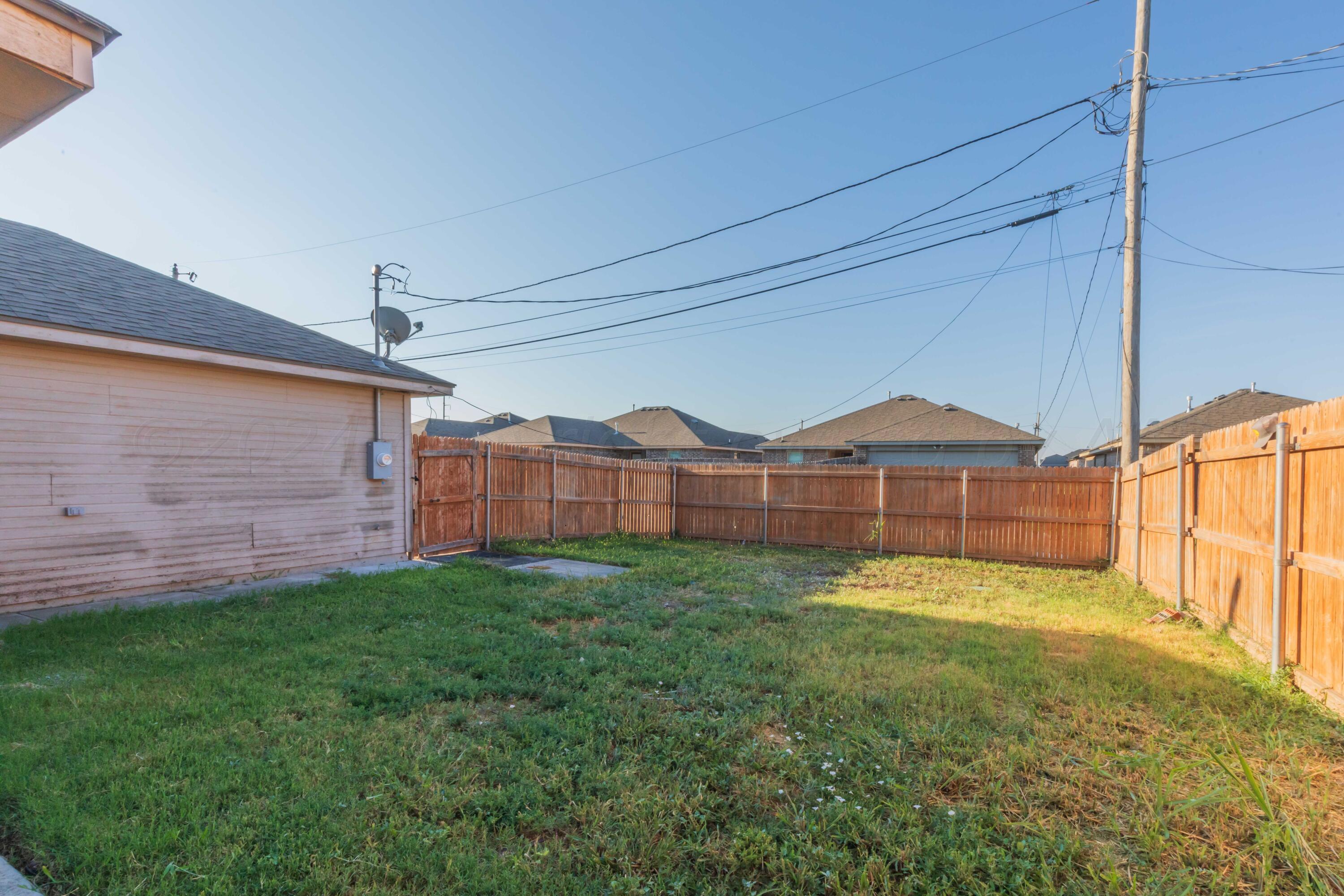 2805 Ries Lane Amarillo, TX 79118 - Photo 33 of 38 a view of a back yard of the house