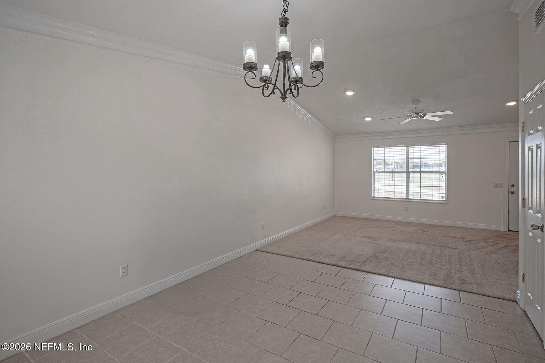 430 Southwest Jasmine Avenue Keystone Heights, FL 32656 - Photo 14 of 35 wooden floor in an empty room with a window