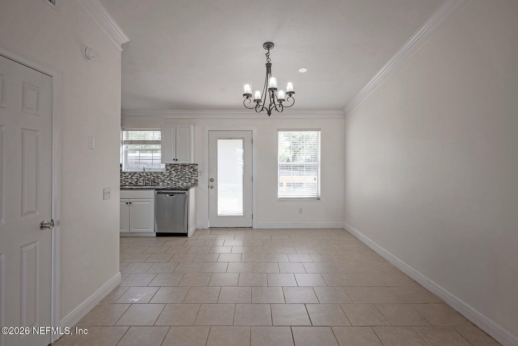 430 Southwest Jasmine Avenue Keystone Heights, FL 32656 - Photo 15 of 35 a view of a kitchen with a sink and dishwasher cabinet