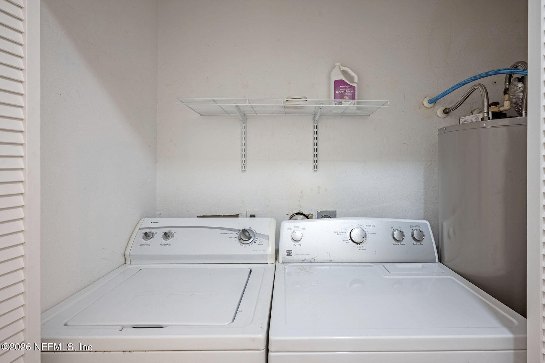 430 Southwest Jasmine Avenue Keystone Heights, FL 32656 - Photo 17 of 35 a utility room with dryer and washer