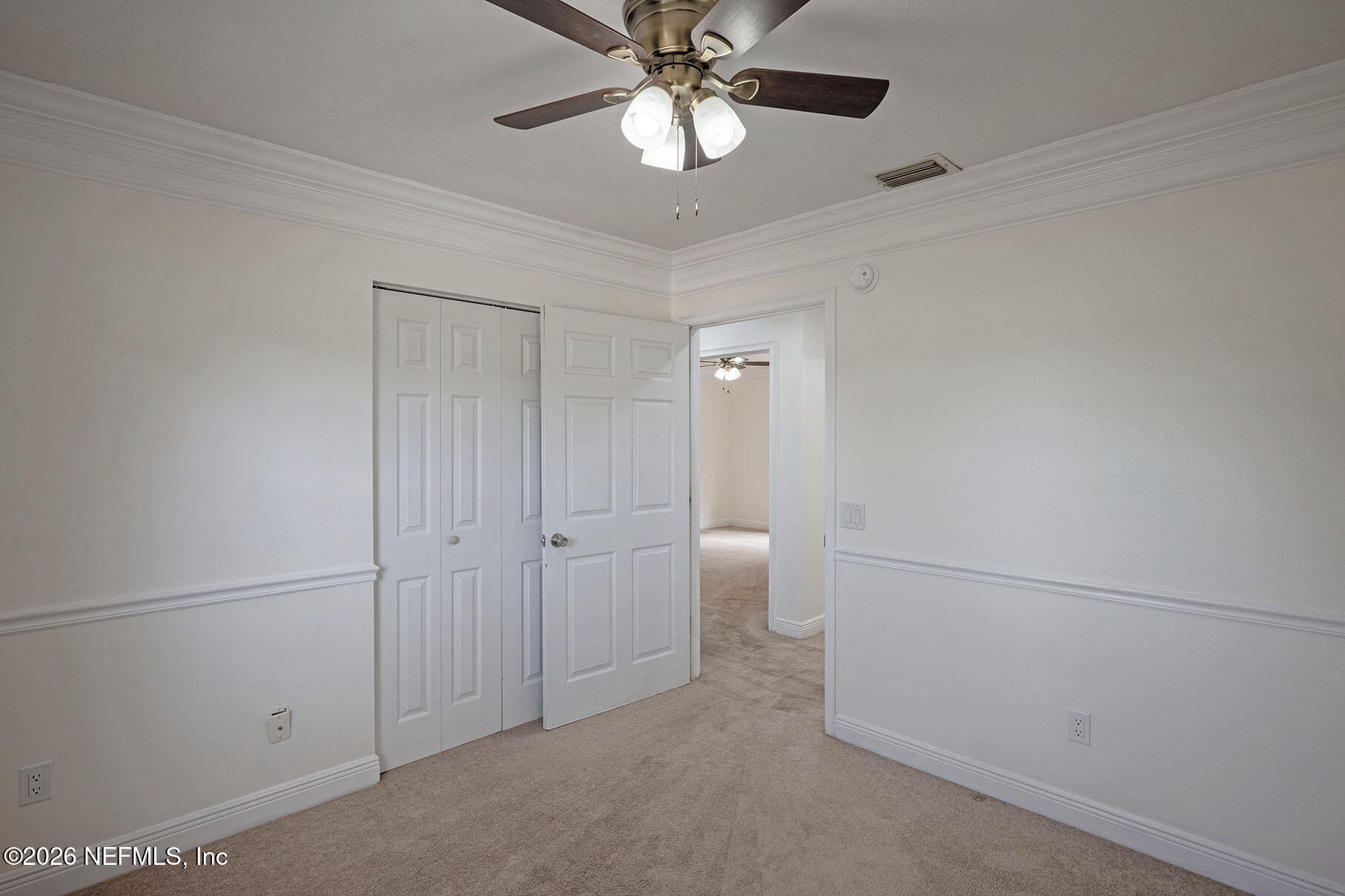 430 Southwest Jasmine Avenue Keystone Heights, FL 32656 - Photo 20 of 35 a view of a room with a chandelier fan and closet area