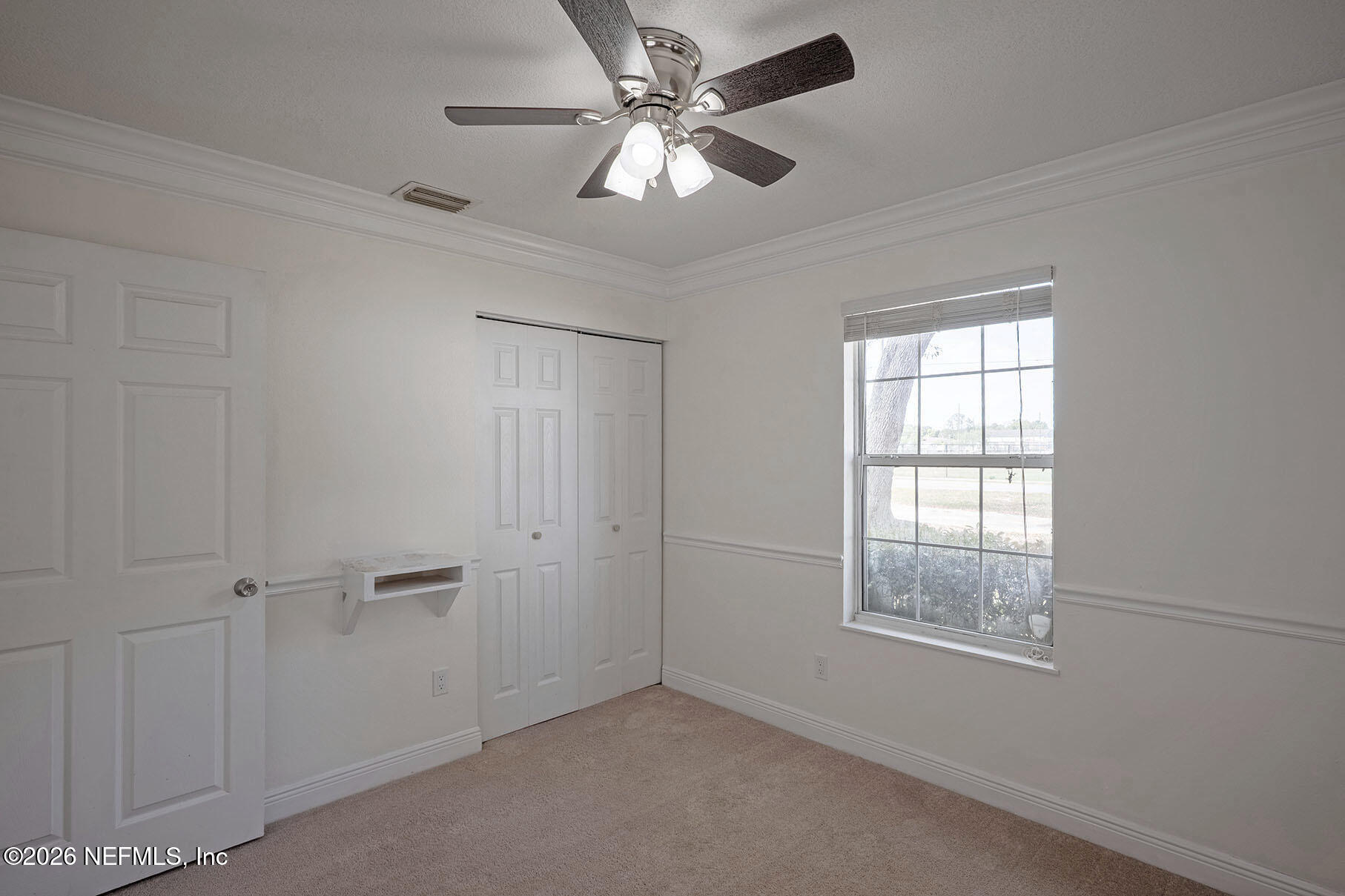 430 Southwest Jasmine Avenue Keystone Heights, FL 32656 - Photo 23 of 37 a view of an empty room with a window