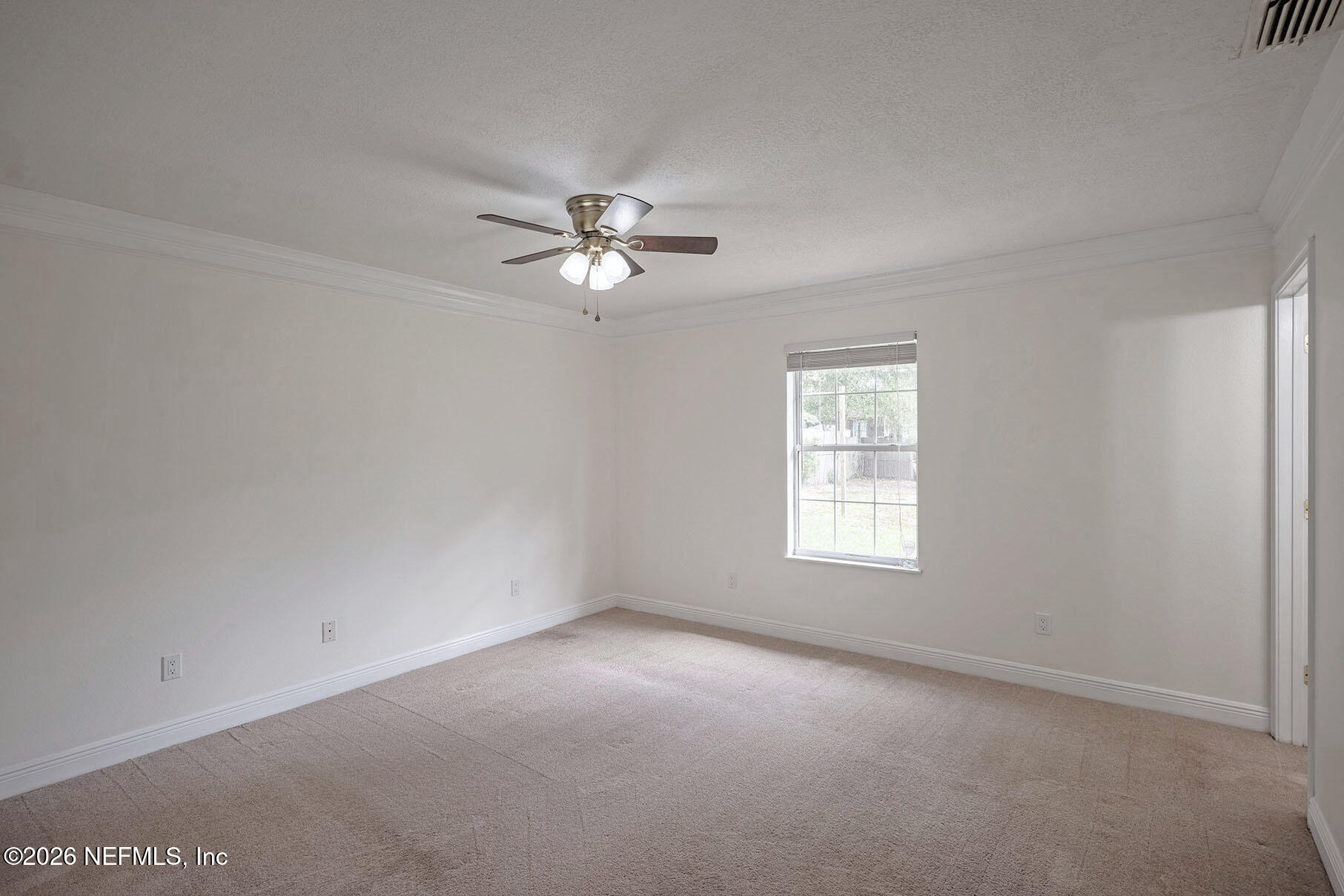 430 Southwest Jasmine Avenue Keystone Heights, FL 32656 - Photo 25 of 37 a view of an empty room with a window