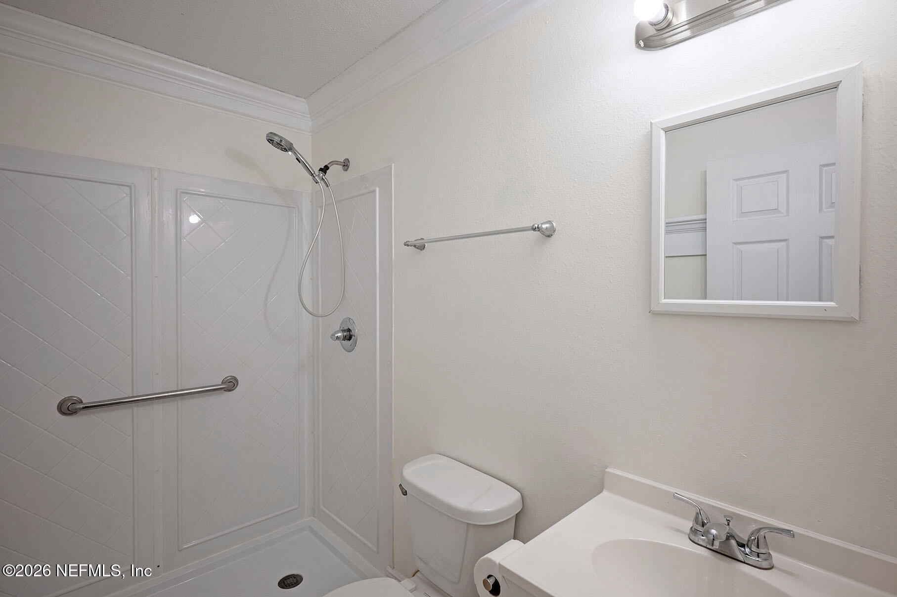 430 Southwest Jasmine Avenue Keystone Heights, FL 32656 - Photo 28 of 35 a bathroom with a shower a toilet and sink