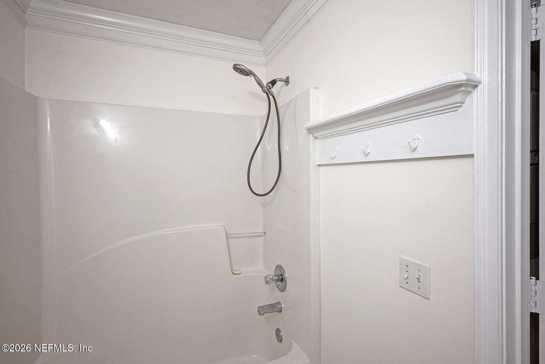 430 Southwest Jasmine Avenue Keystone Heights, FL 32656 - Photo 30 of 35 a bathroom with a glass shower door