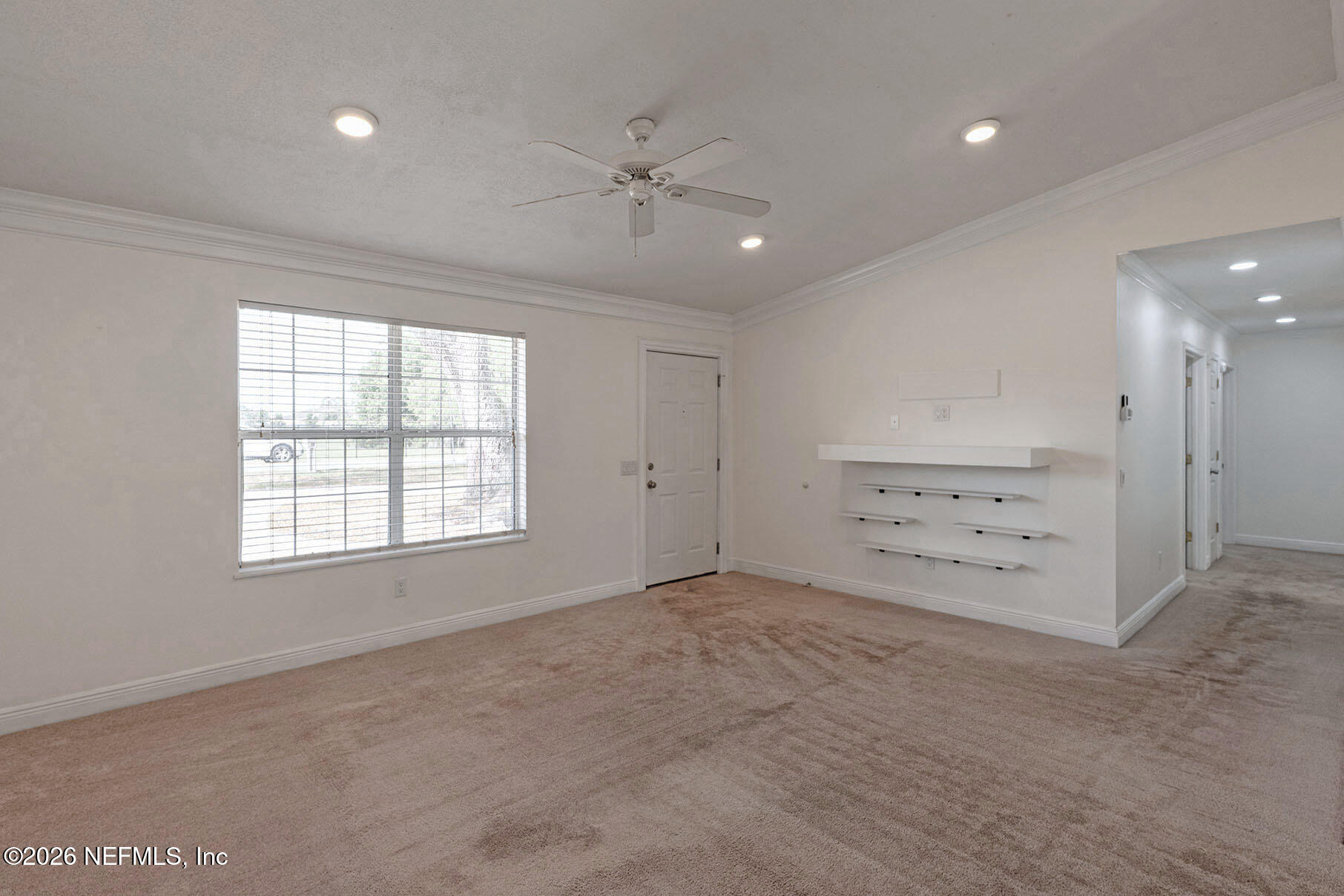 430 Southwest Jasmine Avenue Keystone Heights, FL 32656 - Photo 8 of 35 a view of an empty room with a window