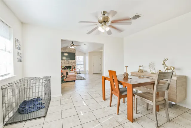 a view of a dining room with furniture