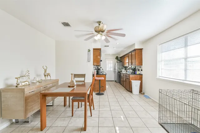 a view of a dining room with furniture