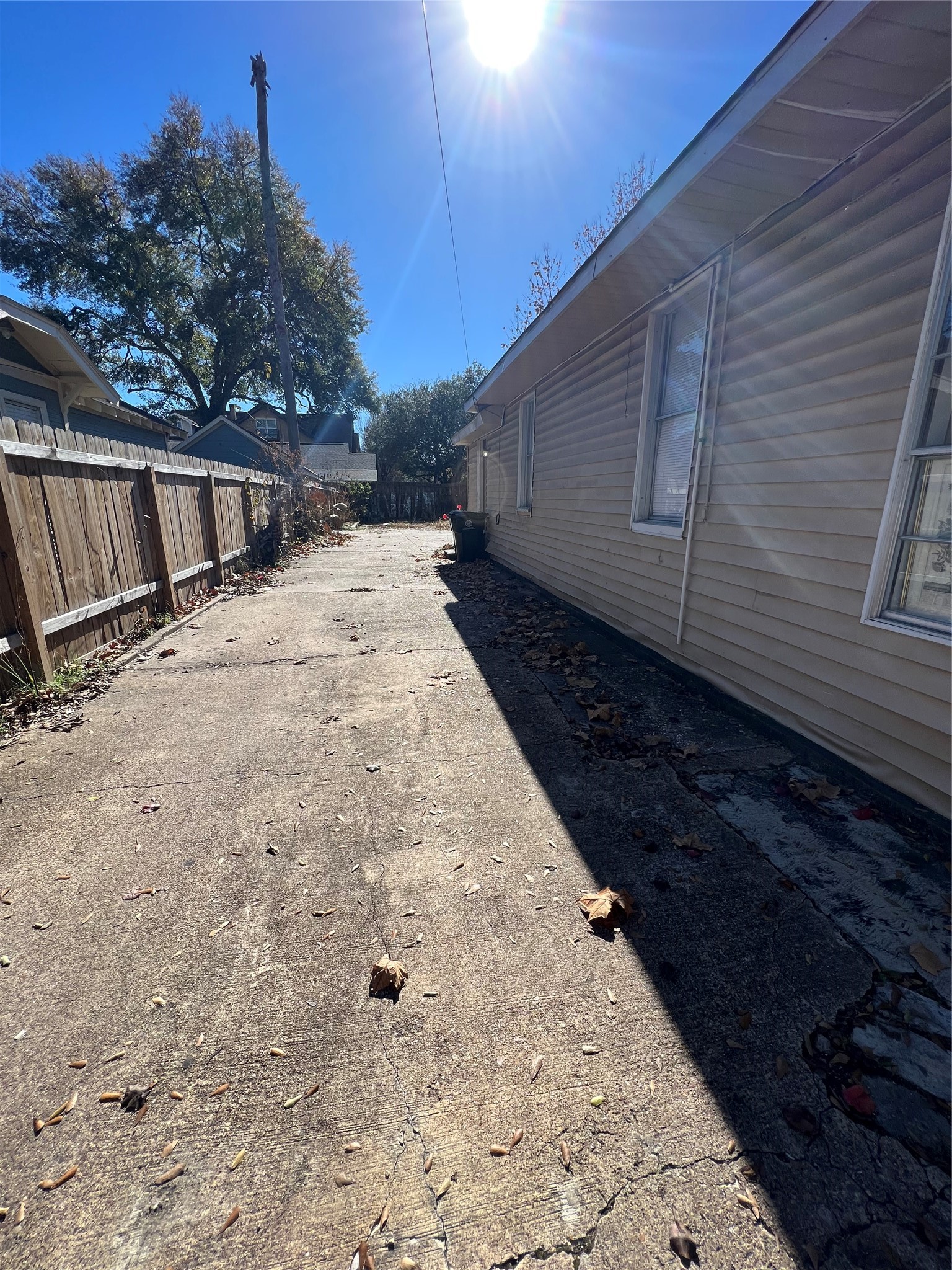 122 Redan Street Houston, TX 77009 - Photo 3 of 5 a view of a yard with wooden fence