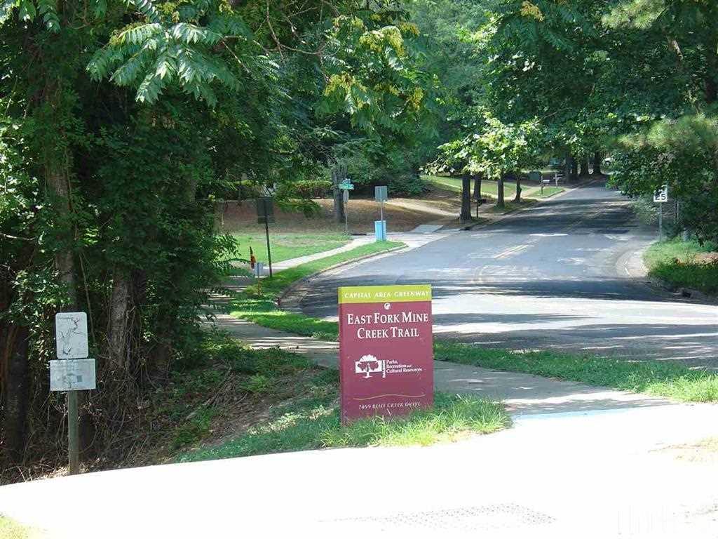 6430 English Oaks Drive Raleigh, NC 27615 - Photo 11 of 11 a view of a park with large trees