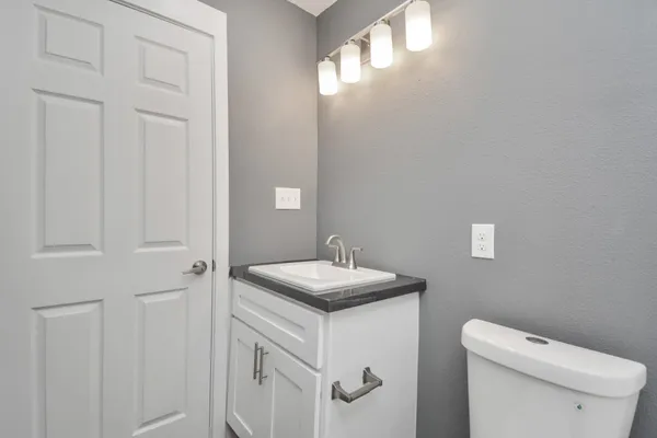 a bathroom with a sink and a toilet