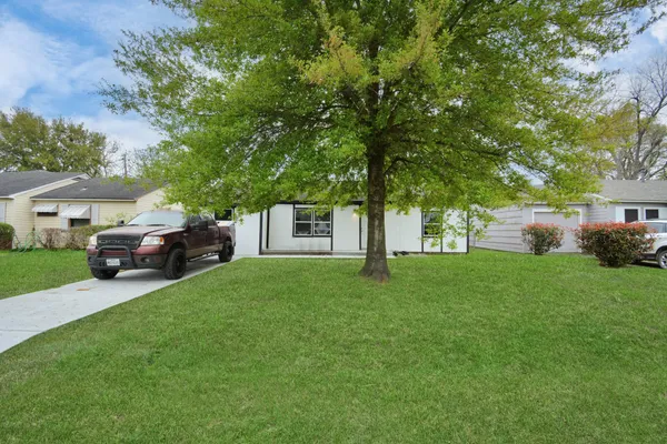 a house view with a garden space