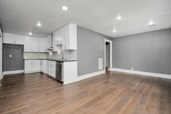 a view of kitchen with wooden floor