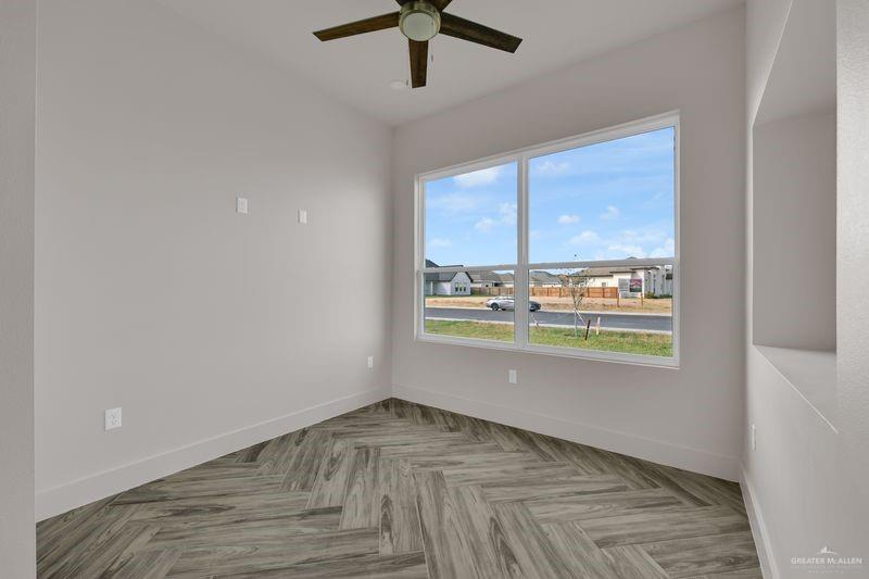 2305 Trinity Avenue McAllen, TX 78504 - Photo 12 of 24 an empty room with a window