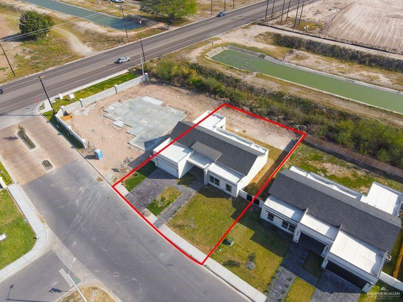 2305 Trinity Avenue McAllen, TX 78504 - Photo 24 of 24 a view of a pool with chairs in front of building