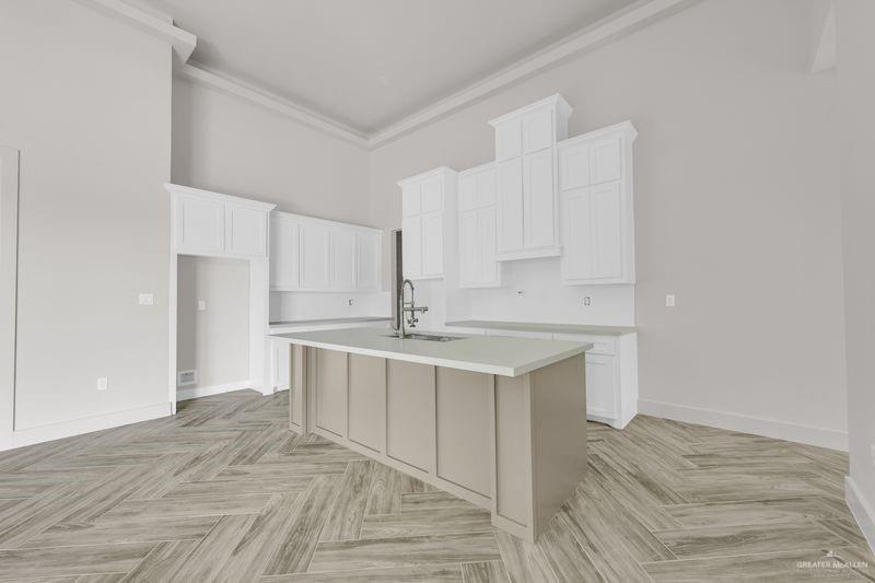 2305 Trinity Avenue McAllen, TX 78504 - Photo 4 of 24 a spacious bathroom with a sink and a mirror