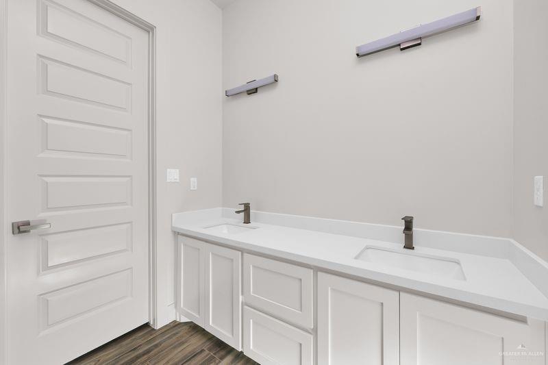 2305 Trinity Avenue McAllen, TX 78504 - Photo 10 of 24 a bathroom with a sink and vanity