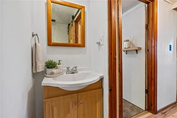 a bathroom with a shower and a bath tub