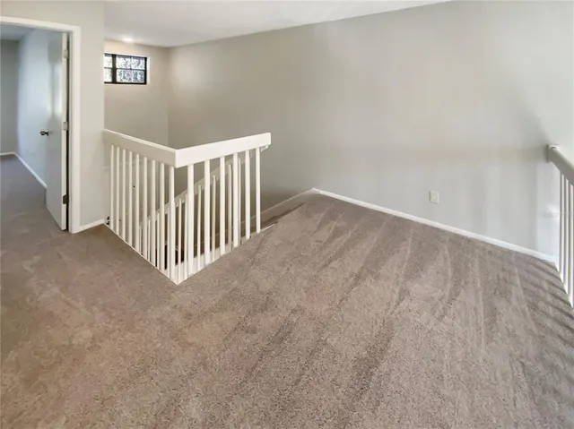a view of a hallway with closet area