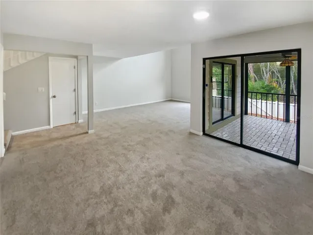 a bathroom with a tub sink double vanity and shower