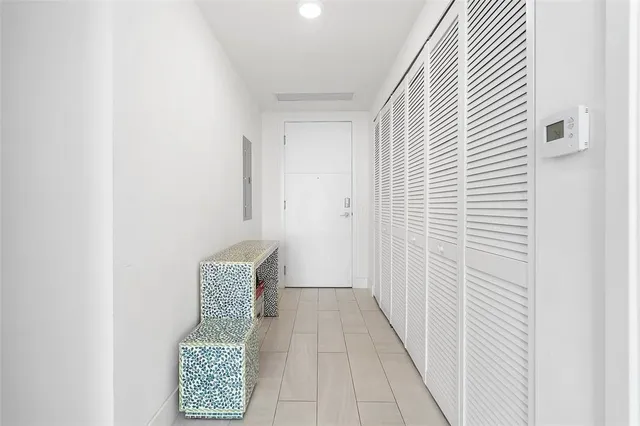 a room with furniture and pool table