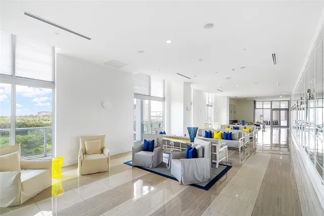 a outdoor living space with patio furniture and a potted plant