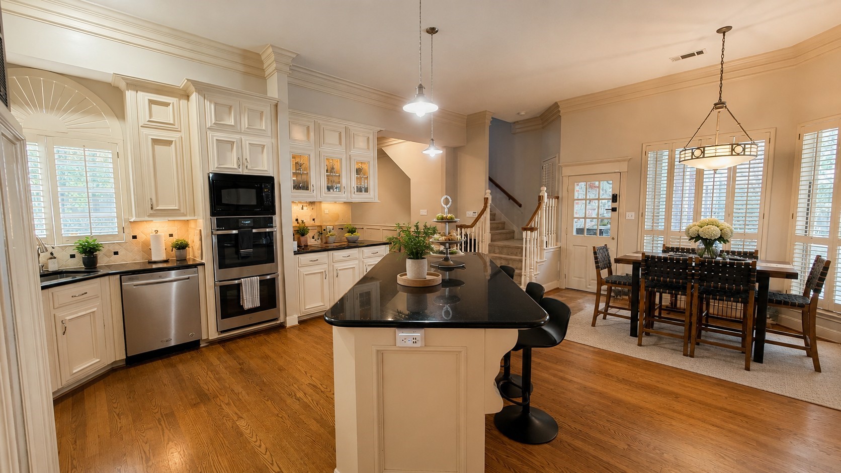 15923 Harwick Drive Spring, TX 77379 - Photo 7 of 16 This view of the kitchen shows the breakfast area and glowing wood floors.