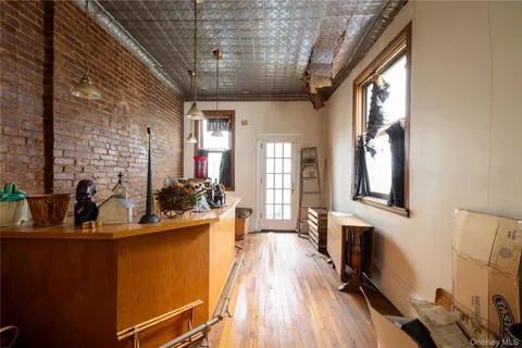 a view of a living room and dining room