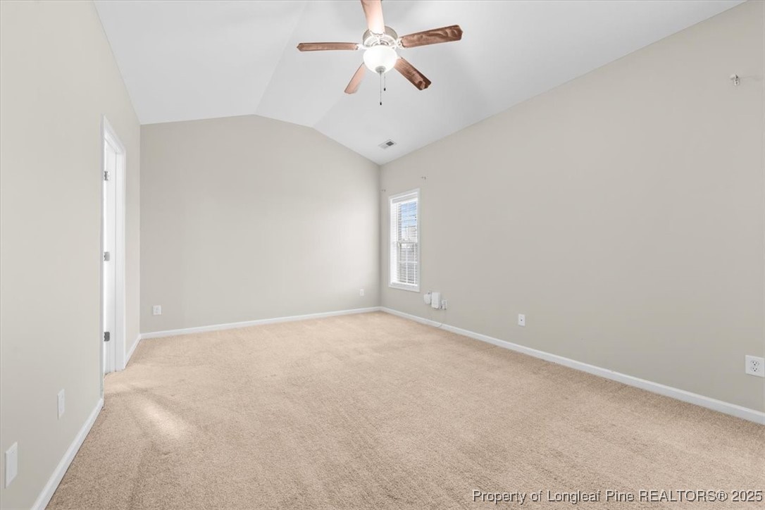 370 Roanoke Drive Raeford, NC 28376 - Photo 12 of 26 an empty room with chandelier fan
