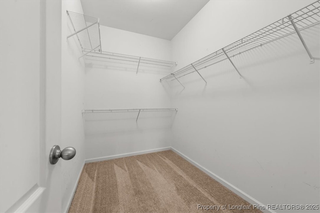 370 Roanoke Drive Raeford, NC 28376 - Photo 18 of 26 a view of a room with racks on the wall