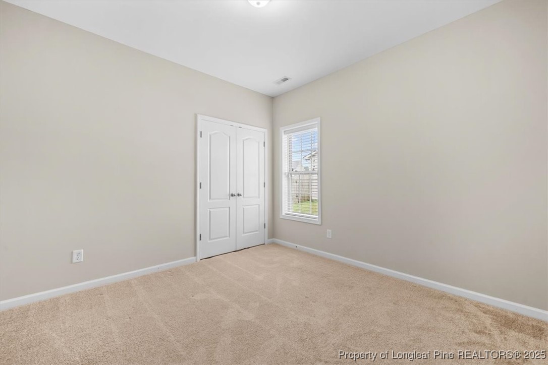 370 Roanoke Drive Raeford, NC 28376 - Photo 19 of 26 a view of an empty room and window
