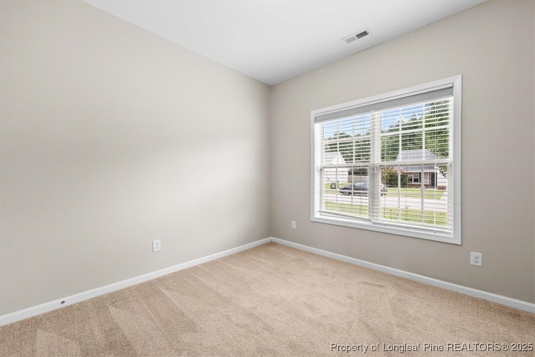 370 Roanoke Drive Raeford, NC 28376 - Photo 20 of 26 an empty room with a window