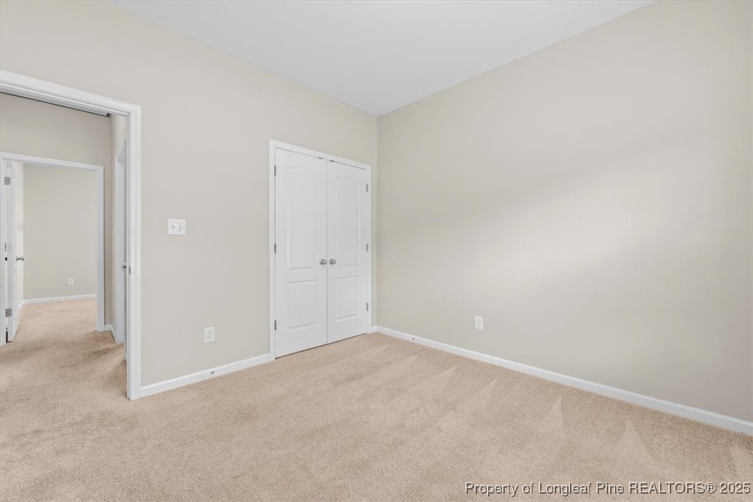 370 Roanoke Drive Raeford, NC 28376 - Photo 21 of 26 an empty room with an entryway
