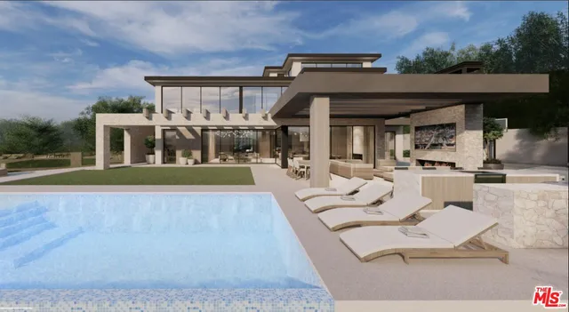 a living room with couches and a flat screen tv