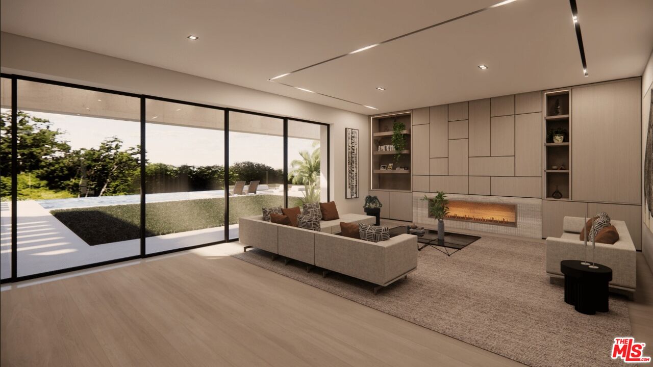 590 North Tigertail Road Los Angeles, CA 90049 - Photo 36 of 69 a lobby with furniture and floor to ceiling window